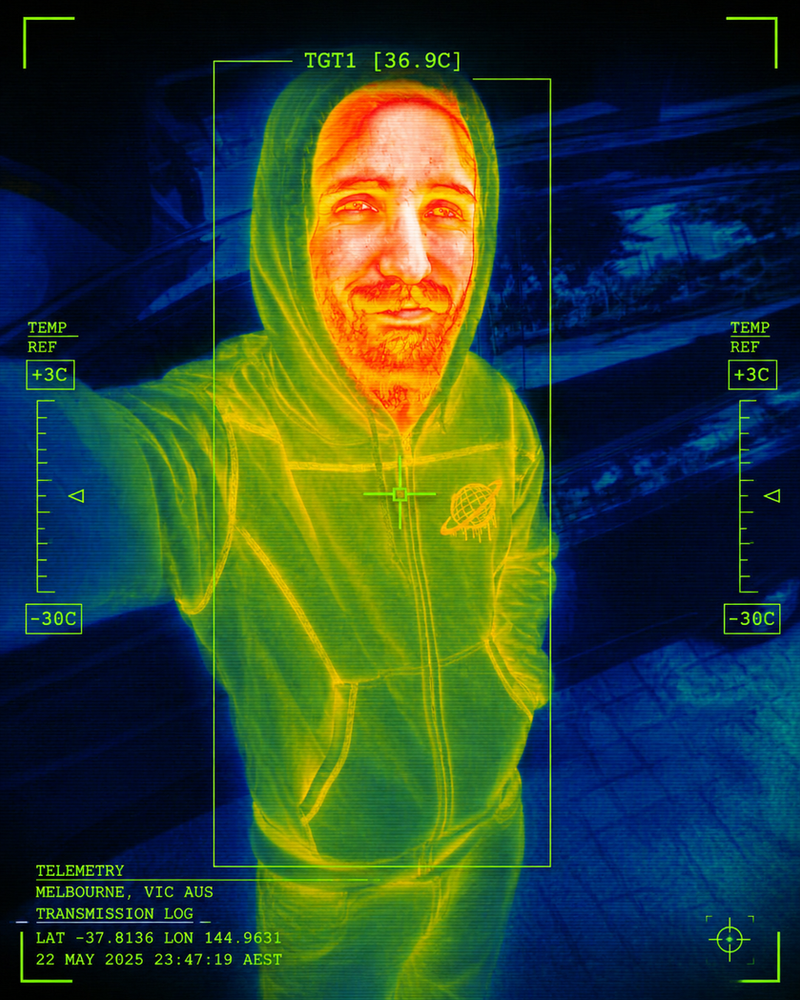 Thermal-imaging portrait of a person in a Spacely hooded top