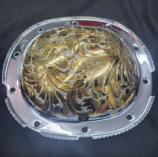 Hand-engraved gold and chrome motorcycle derby cover