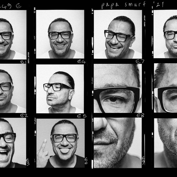 Black and white contact sheet of expressive portraits of a man in glasses