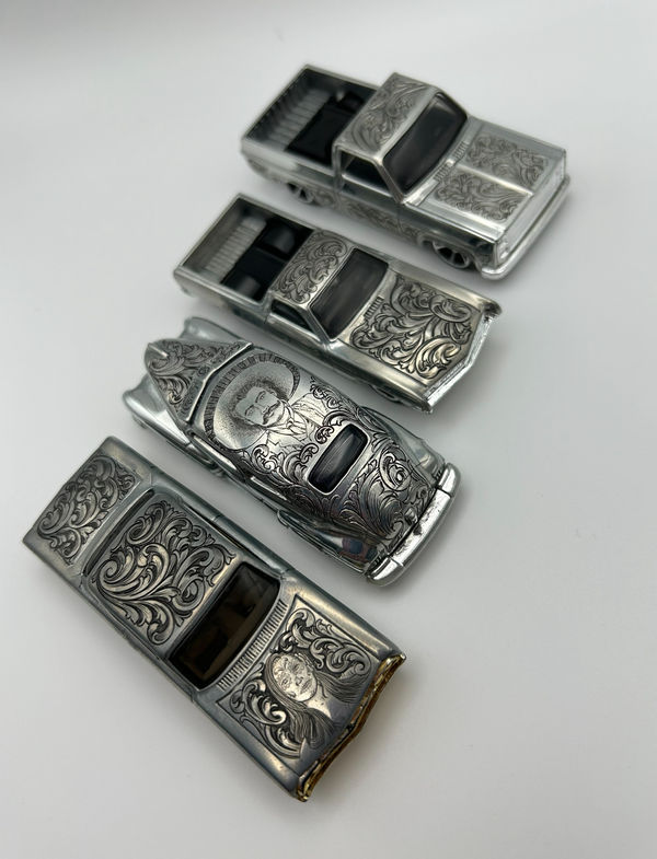 Set of hand-engraved silver belt buckles