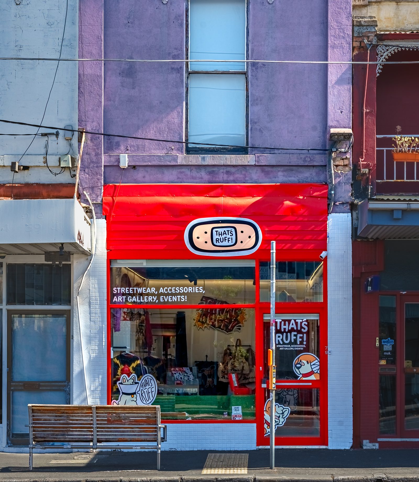 The THAT'S RUFF shopfront on Johnston Street, red awning and bandaid logo