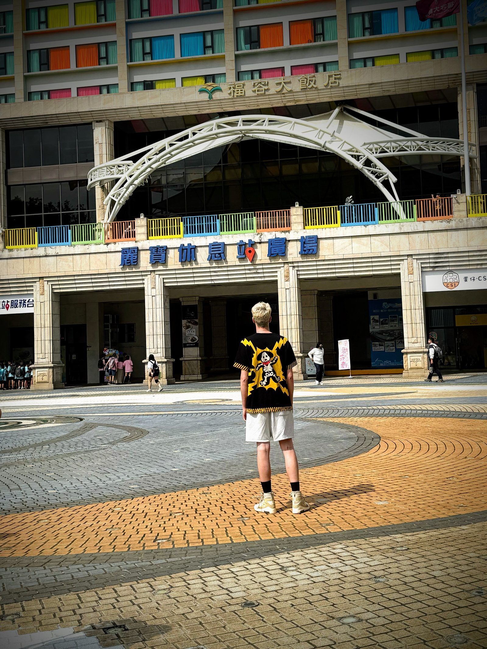 A THAT'S RUFF tee worn in a tiled plaza a long way from Melbourne